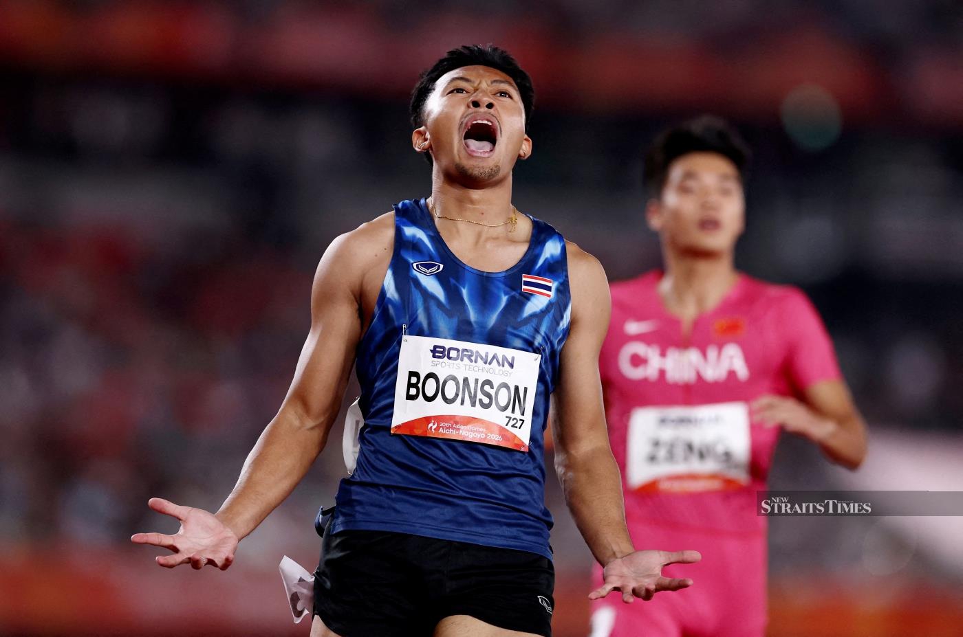 Puripol Boonson célèbre son record des Jeux asiatiques du 100 m à Nagoya en 2026